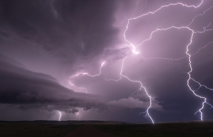 Lightning barrage after dark from a supercell thunderstorm
